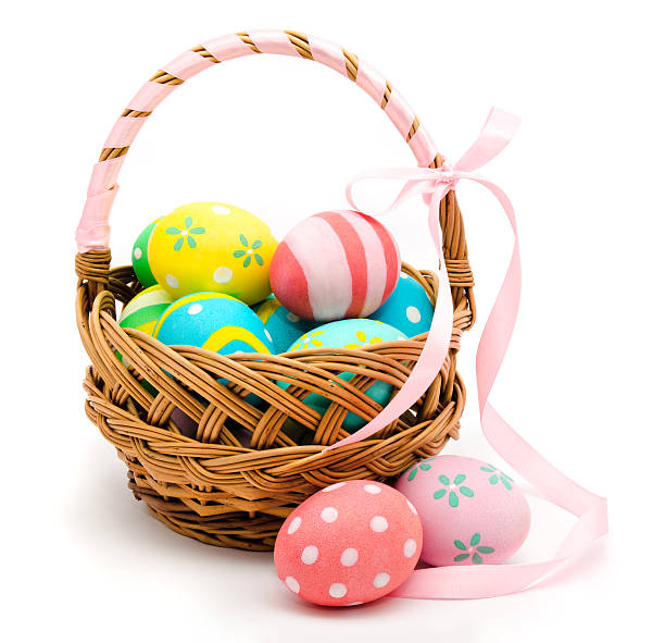 istock Colorful handmade easter eggs in the basket isolated 535449877
