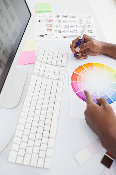 istock Businessman working with colour wheel and taking notes 535450957