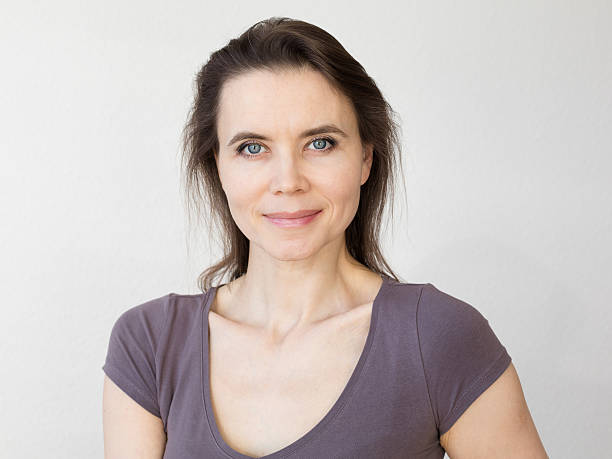 istock Woman with attractive smile looking into camera 535451255