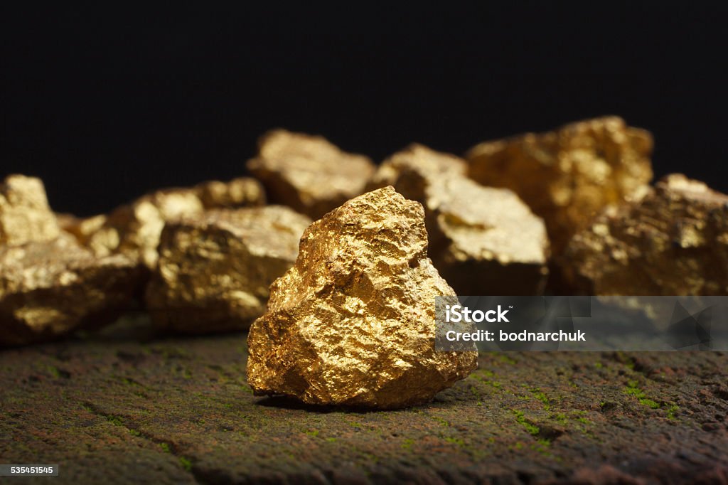 nugget gold Closeup of big gold nugget Gold - Metal Stock Photo