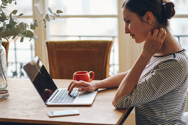 istock Young woman working in her Parisian apartment 535451840