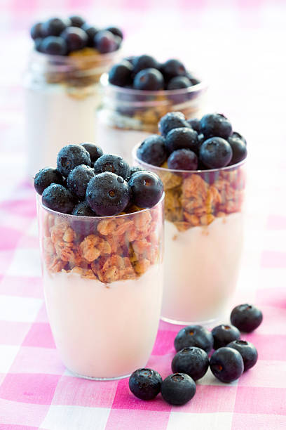 Yogurt and cereal breakfast stock photo