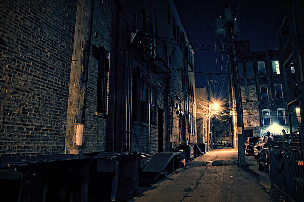 Dark City Alley Dark Urban Alley at Night alley stock pictures, royalty-free photos & images