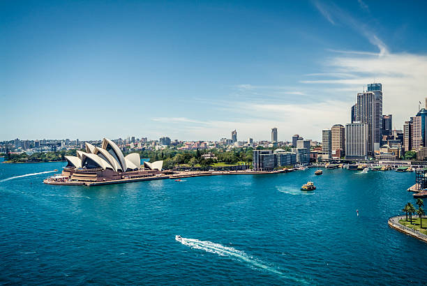 View of Sydney Harbour, Australia Sydney Opera House and Circular quay, ferry terminus, from the harbour bridge. australia photos stock pictures, royalty-free photos & images