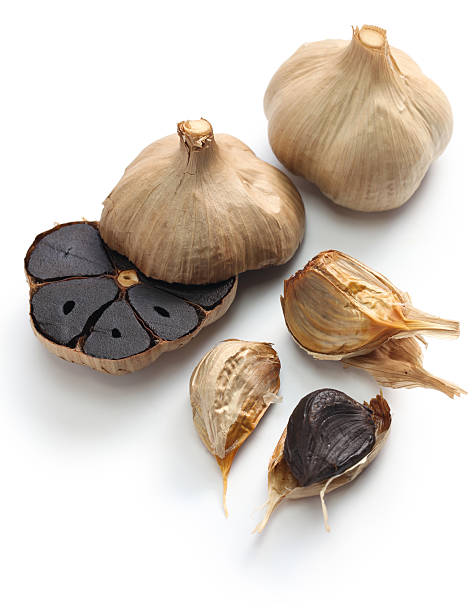 istock black garlic bulbs and cloves 535455679