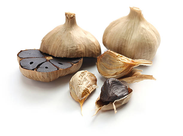 istock black garlic bulbs and cloves 535455797