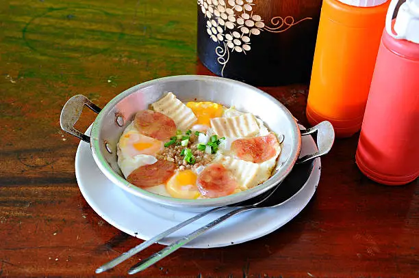 Photo of fried egg in pan breakfast (Vietnamese style)