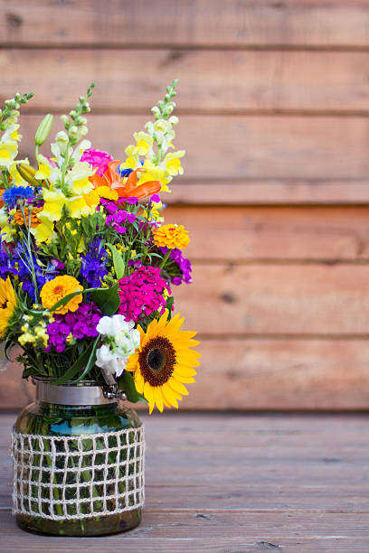 istock flower arrangement bouquet sitting on wooden deck 535459488
