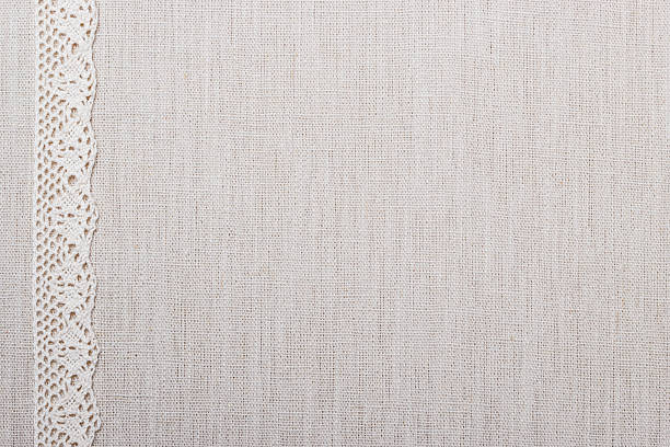 istock Lace ribbon on linen cloth background 535460834