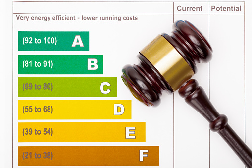Efficiency chart with judge gavel over it