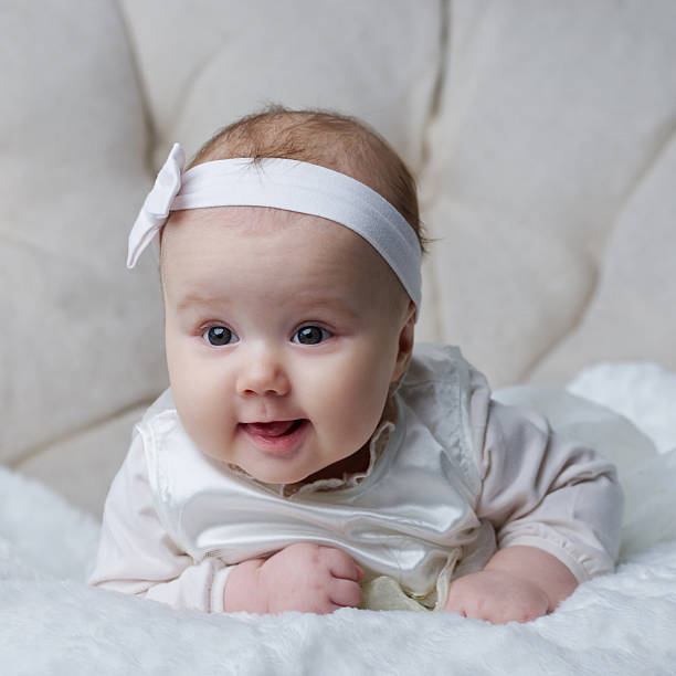 istock cute baby on bright background 535464344