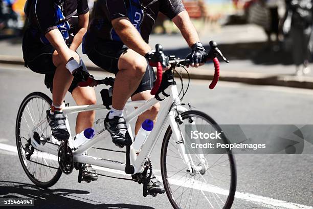 Two Sets Of Legs Are Better Than One Stock Photo - Download Image Now - Tandem Bicycle, Tandem, Bicycle