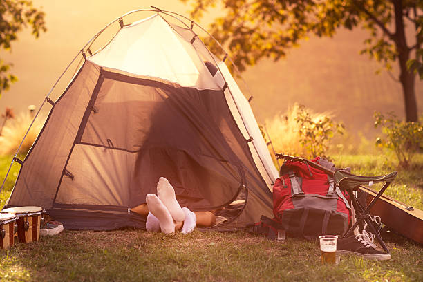 Comping and love Young couple having sex in tent music festival camping summer vacations stock pictures, royalty-free photos & images