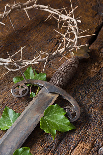 Crown of thorns and sword