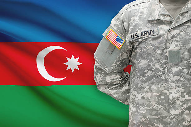 istock American soldier with flag on background - Azerbaijan 535465905