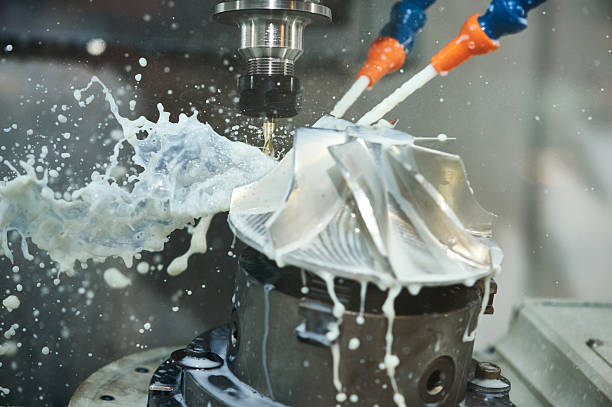 Milling metalworking process. Precision industrial CNC machining of metal detail by cutting mill at factory