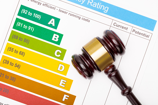 Judge gavel over efficiency chart - view from top