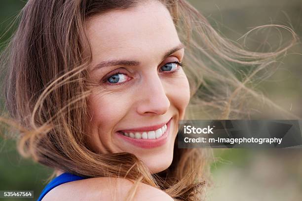 Healthy Smiling Woman Outside Stock Photo - Download Image Now - Summer, Human Face, Women
