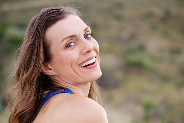 istock Healthy older woman smiling outside 535467728