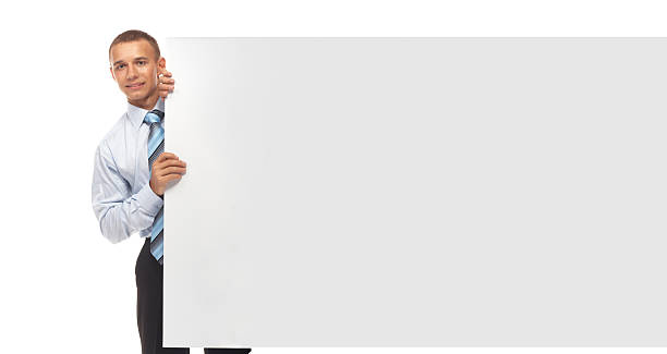 istock businessman with big visiting card 535468609