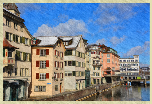 historical houses lined-up along the eastern bank of Limmat River in Zurich, Switzerland