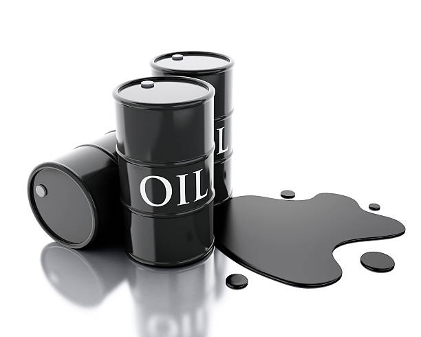 istock 3d Three barrels of oil spilled. 535476020