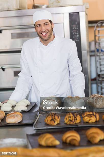 Smiling Baker Looking At Camera Stock Photo - Download Image Now - Baker - Occupation, 2015, 30-34 Years