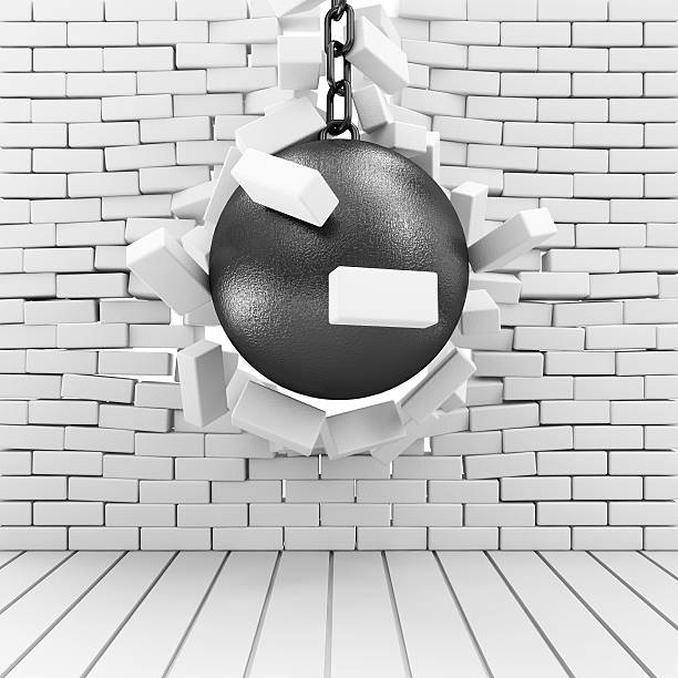 istock Abstract Illustration of Brick Wall Broken by Wrecking Ball 535476257