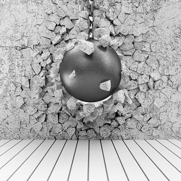 istock Abstract Illustration of Concrete Wall Broken by Wrecking Ball 535476267
