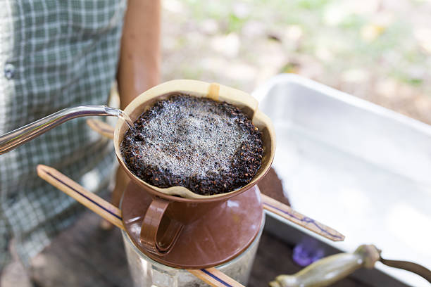 istock Hand drip coffee, Barista pouring  water on coffee 535476674