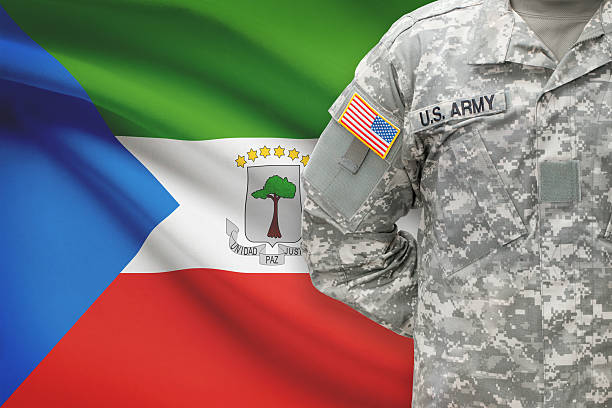 istock American soldier with flag on background - Equatorial Guinea 535477027