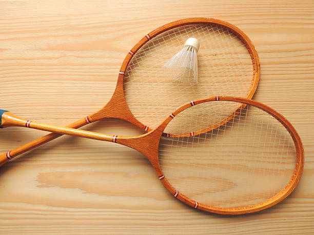 Sports equipment badminton on a wooden Board. stock photo