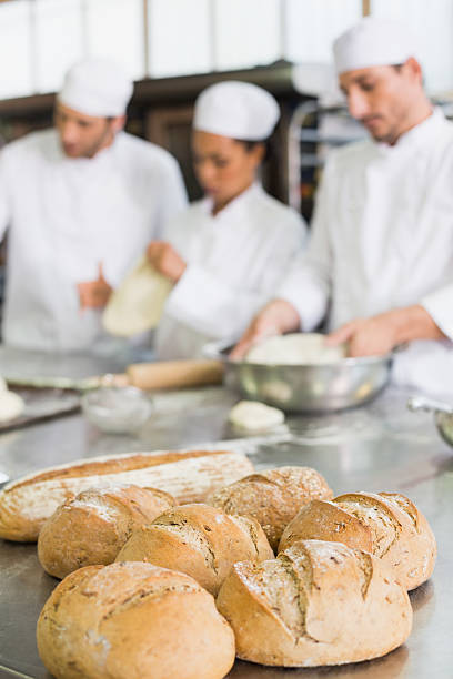 istock Team of bakers working at counter 535477189