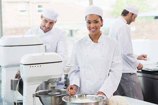 istock Team of bakers working at counter together 535477253