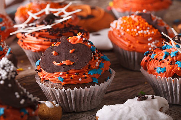 istock cupcakes with Halloween jack close-up on the table. horizontal 535477678