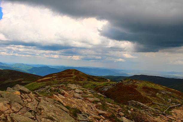 istock Dark clouds coming on the blue sky 535478399