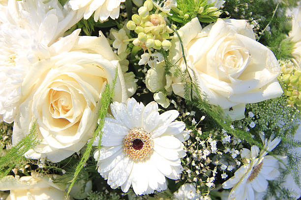 istock white floral arrangement in the sun 535478416