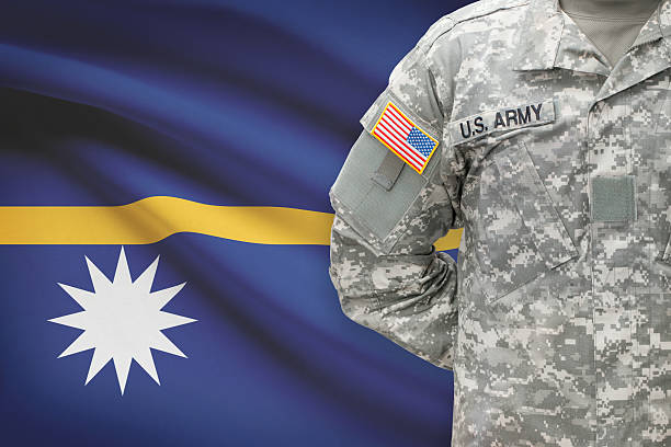 istock American soldier with flag on background - Nauru 535478665