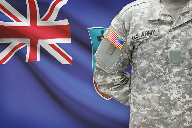 istock American soldier with flag on background - Montserrat 535479205