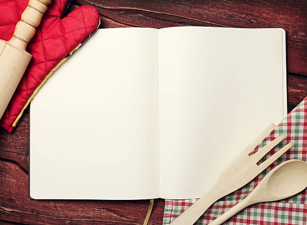 istock Blank recipe book on wooden table 535479489