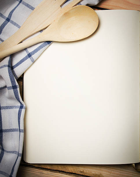istock Blank recipe book on wooden table 535479491