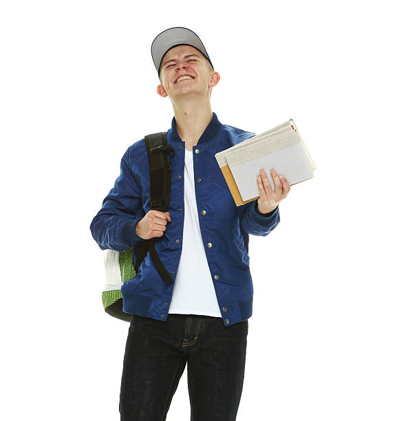istock Cheerful male student holding book 535481212
