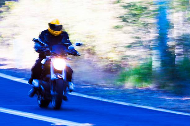 istock Speeding Motorbike on highway, copy space 535481523