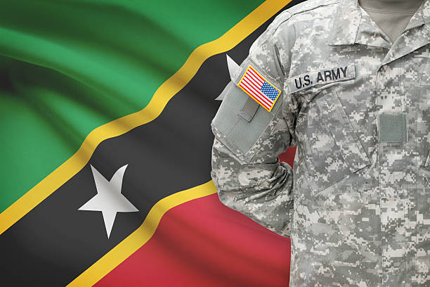 istock American soldier with flag - Saint Kitts and Nevis 535482059