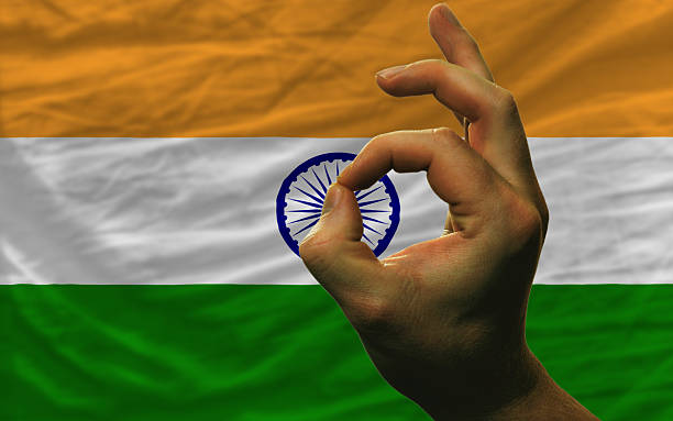istock ok gesture in front of india national flag 535482231