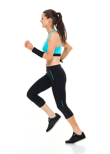 istock Smiling sports woman running 535482370