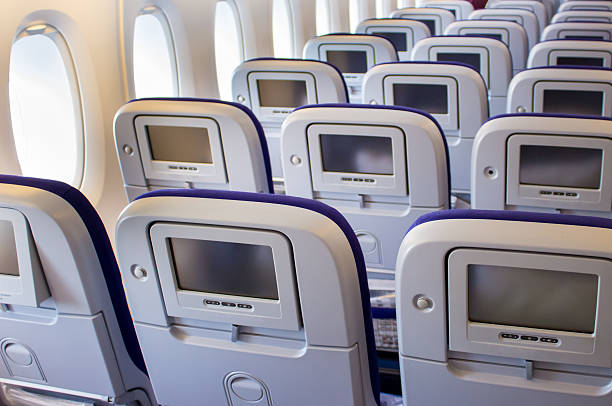 istock The interior of passenger airplane with the seats 535483430