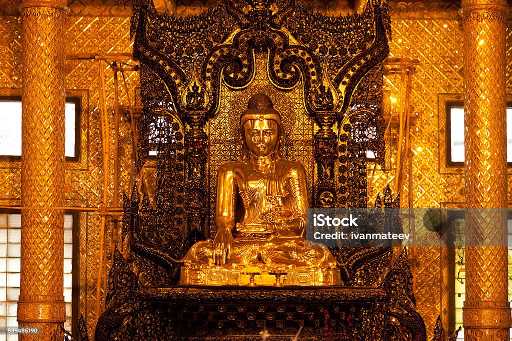 Inside Botataung Pagoda, Yangon Buddha statue inside Botataung Pagoda in Yangon, Myanmar. (Public space) Buddha Stock Photo