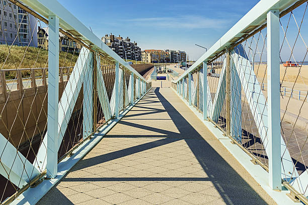istock The cycle path with a fence from the grid. 535486060