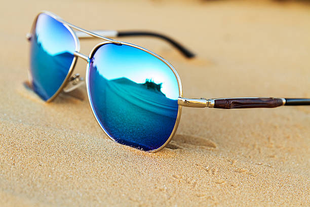 istock Sunglasses on the sand in the desert. 535486434